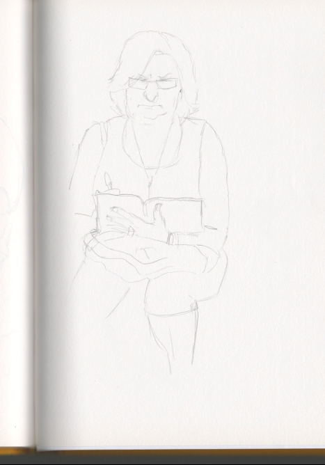 Dibujo en el metro de Bilbao de una mujer concentrad�sima en su sudoku.